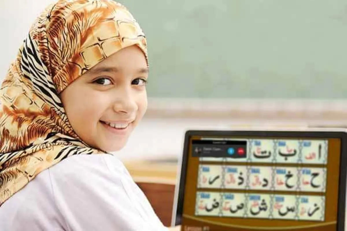 A child receiving support with Quran learning